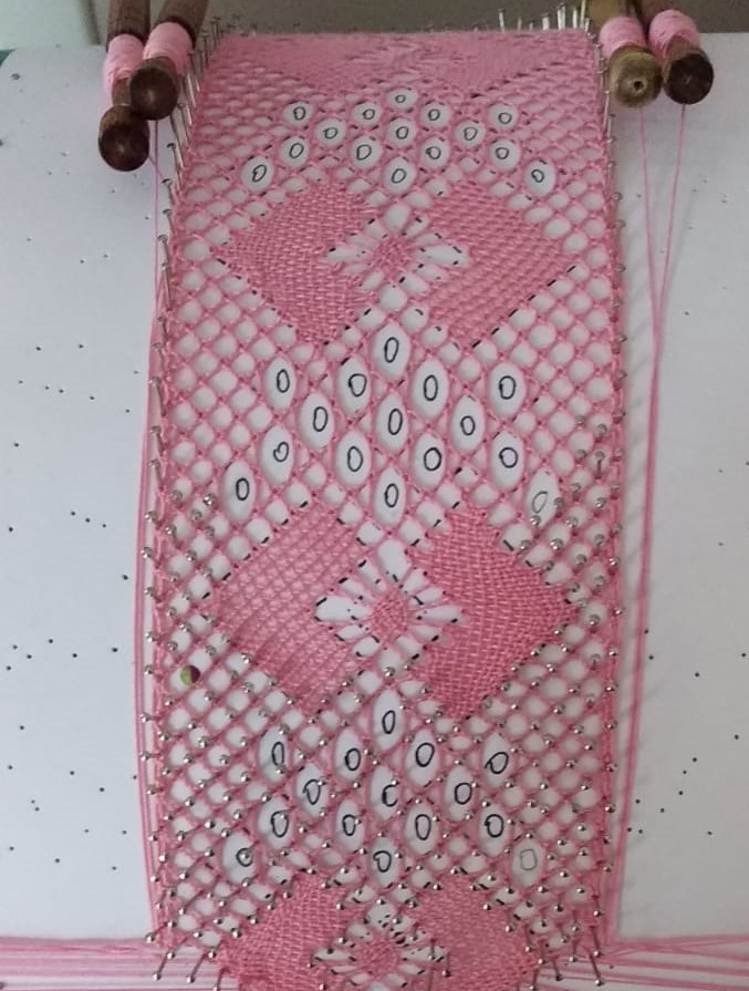 Introduzione merletto a fuselli