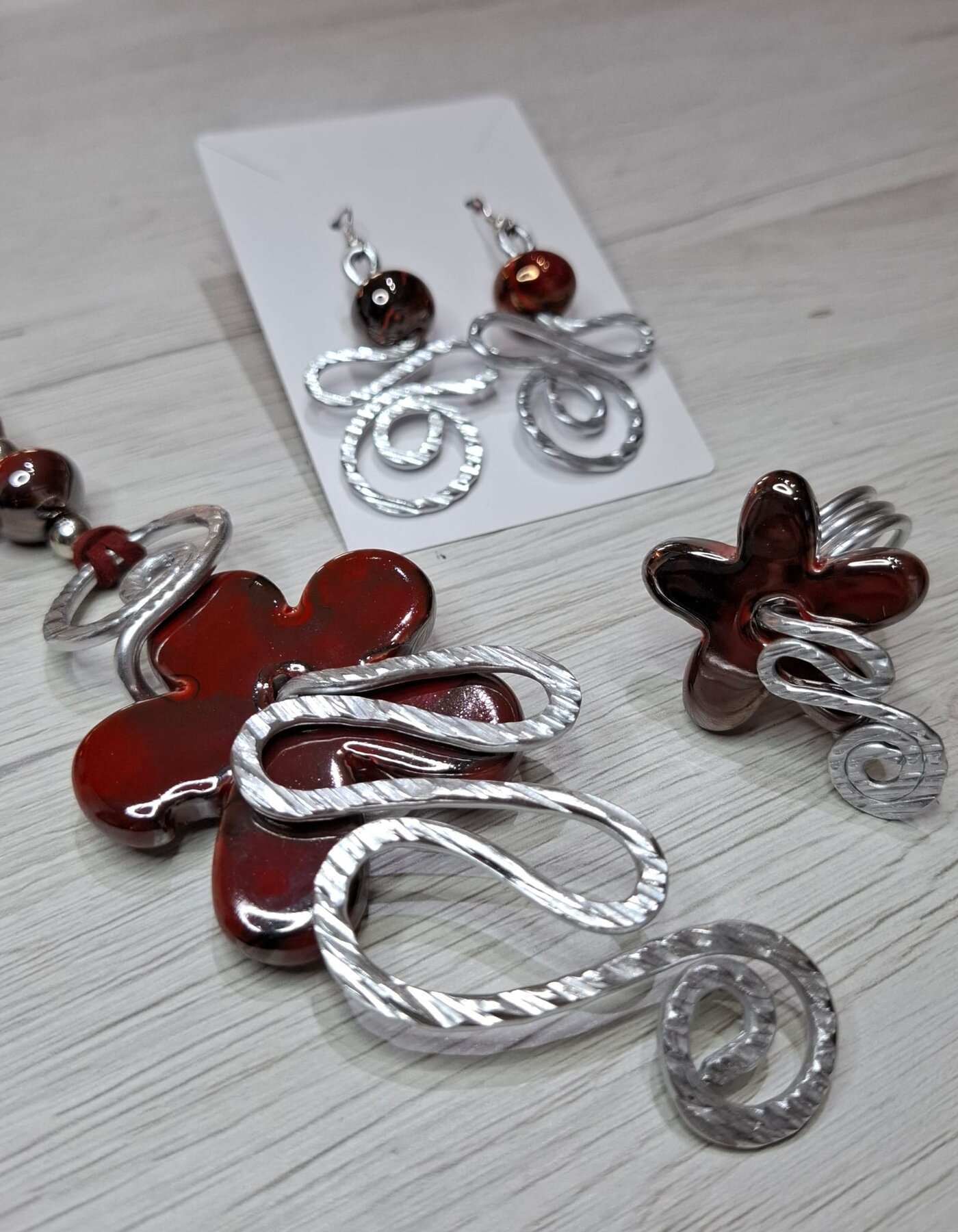 Ciondolo in alluminio e ceramica