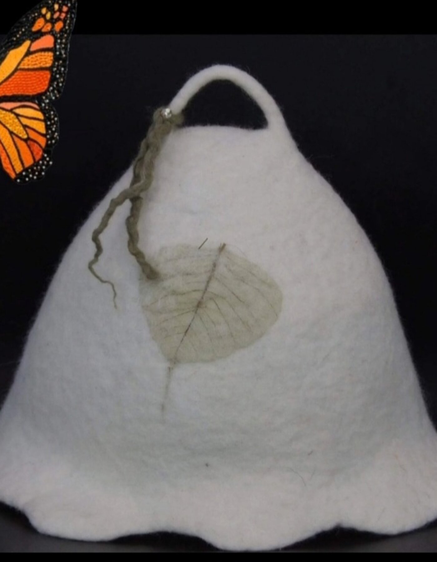 Cappello in lana cardata