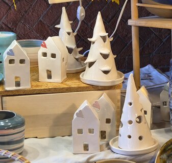 small white ceramic houses and trees